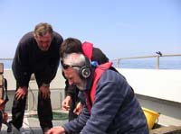 s01 IMG_2972 skipper Colin Barnes watches Eugene monitor hydrophone